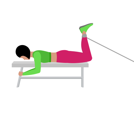 Woman Doing Cable Bench Lying Leg Curl Exercise For Legs