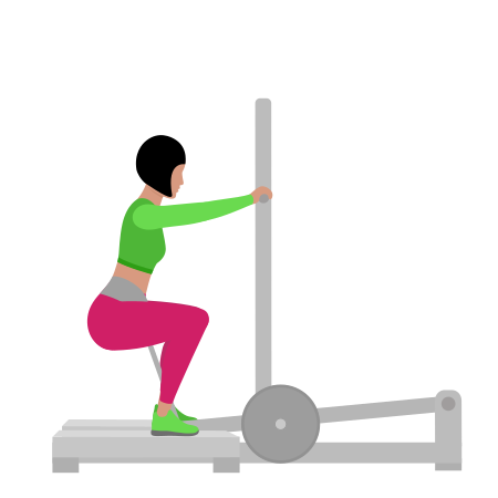 Woman Doing Lever Belt Squat Exercise For Legs